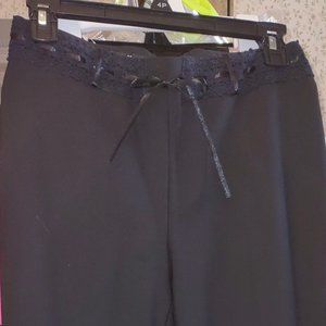 INC straight leg jetblack women's pant with lace inset waist. NWOT size 4P